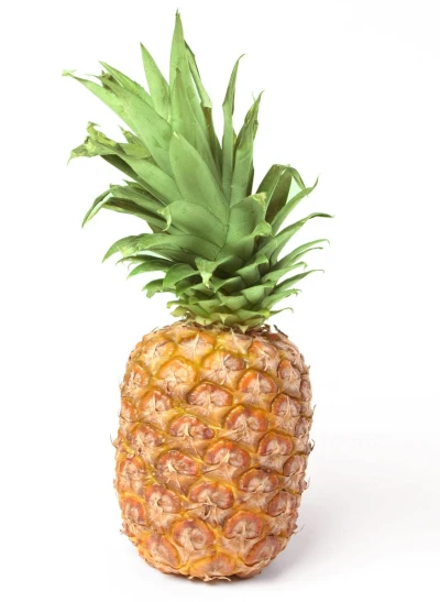a pineapple with yellow seeds on a white surface