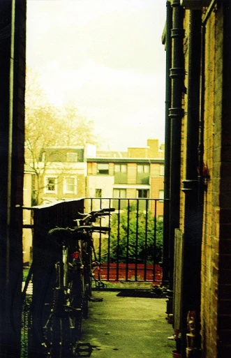 a couple of bicycles are parked outside of a doorway