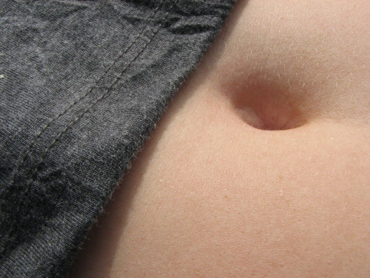 an image of a womans belly with it's  exposed