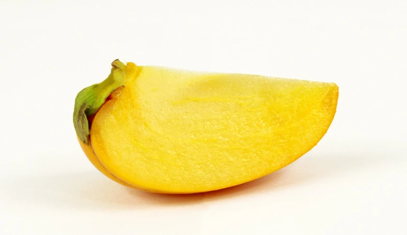 a piece of fruit is shown with the green end of the peel