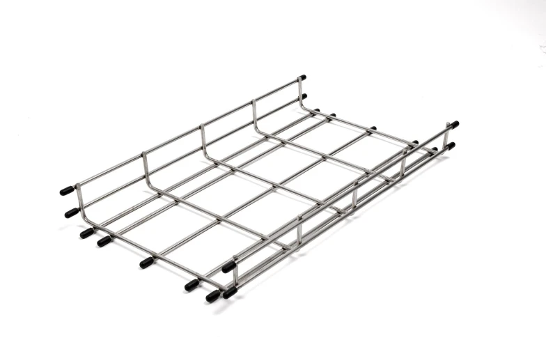 an aluminum roof rack on the side of a white wall