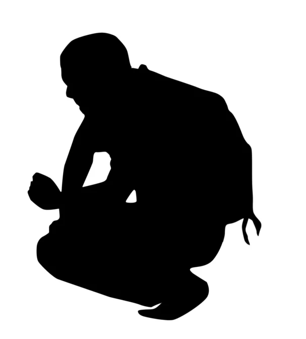 a black and white silhouette of a man kneeling down