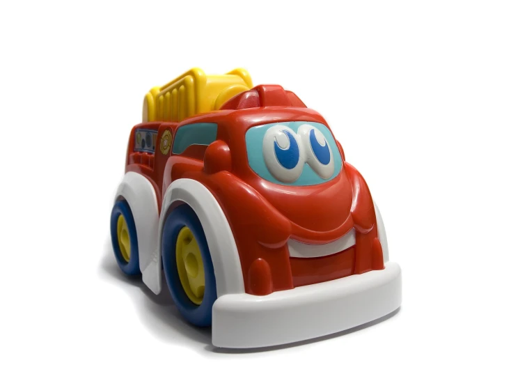 red, yellow, and blue toy car with eyes