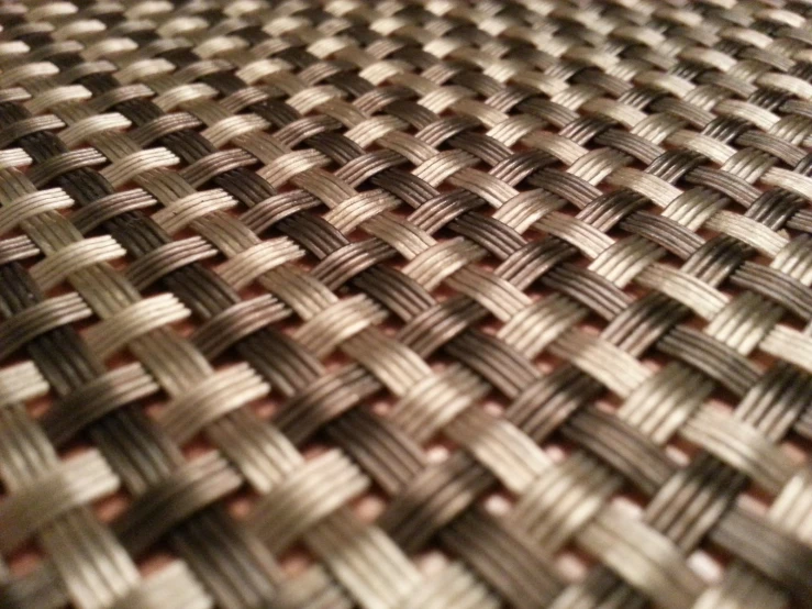 a close up image of the surface of some metallic material