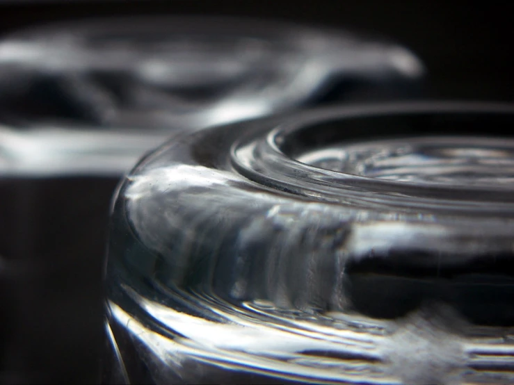 a glass jar is shown with a black background