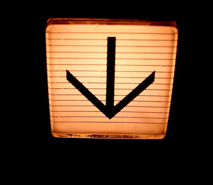 a square picture of a arrow that is in an upside down case