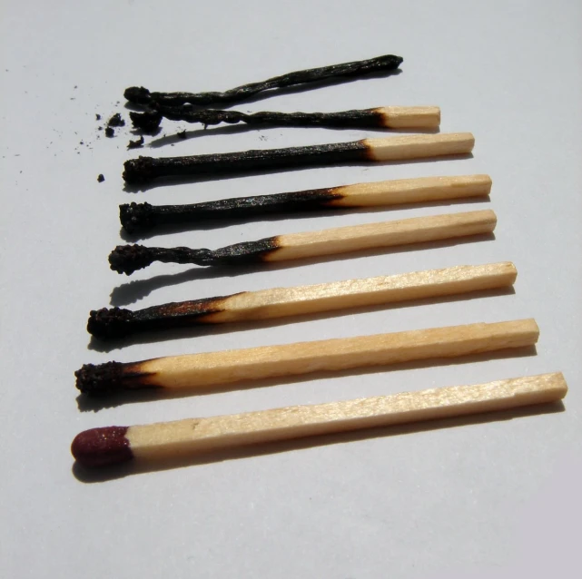 seven matches sticks arranged next to each other