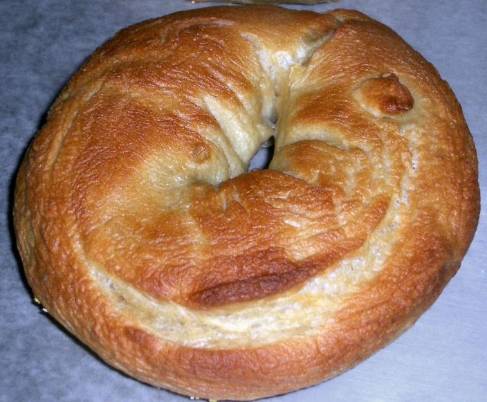 bread with icing and a smiley face on it