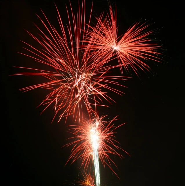 fireworks are being observed at the beach as part of new year's celetions