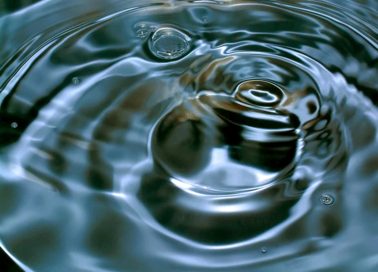 water being swirled around some metal discs