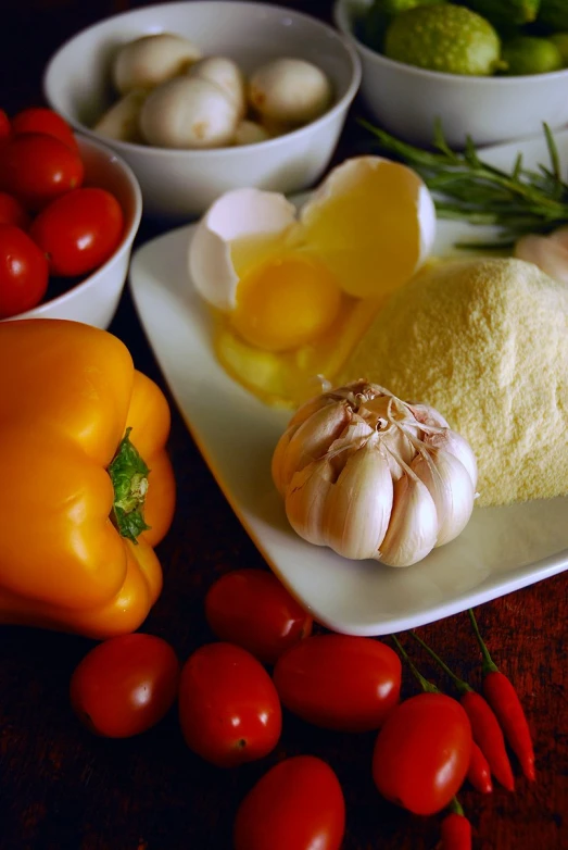 tomatoes, peppers and spices on a tray