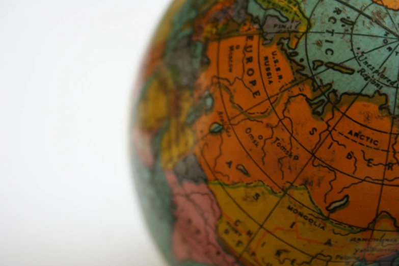 a closeup view of an old and damaged, antique looking earth globe