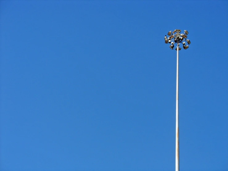 a large metal pole in the sky