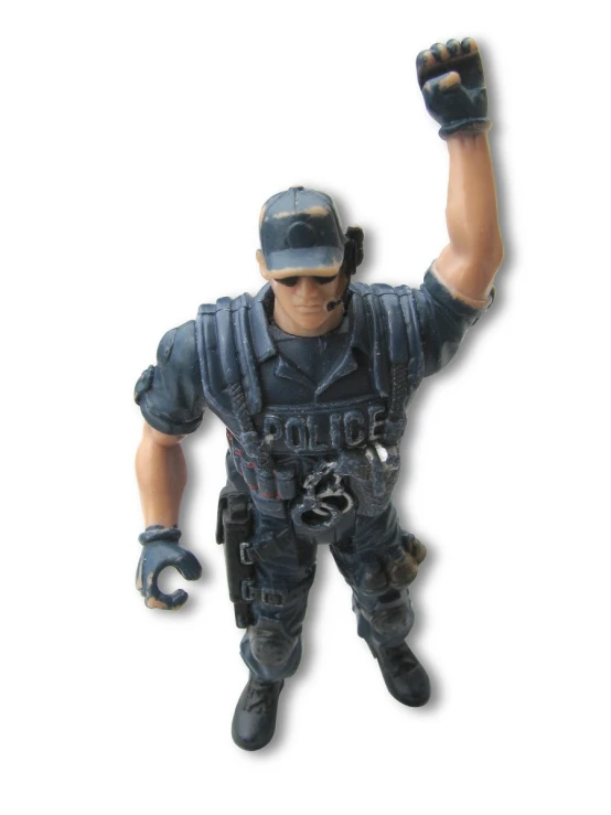 a police figure is posed in full uniform