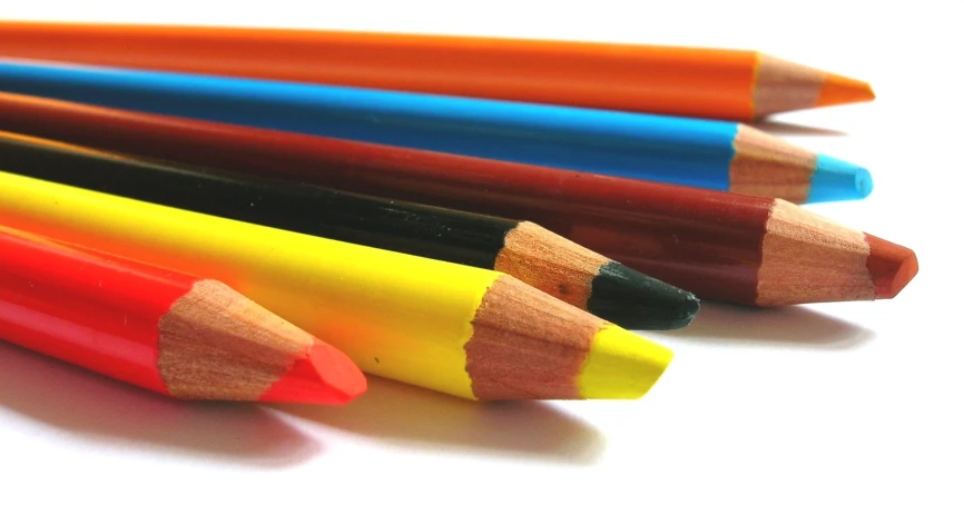 several pencils laying on top of each other