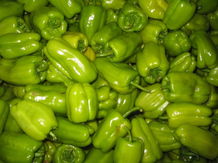 a close up of several different kinds of peppers