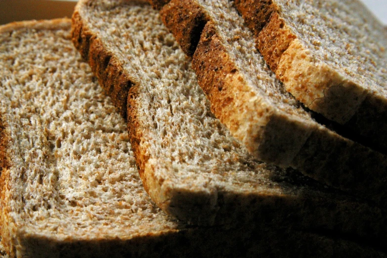 a close up of a loaf of brown bread