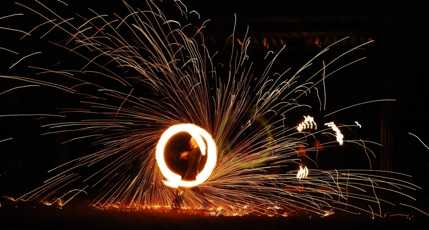 bright circular lights shine over an open field