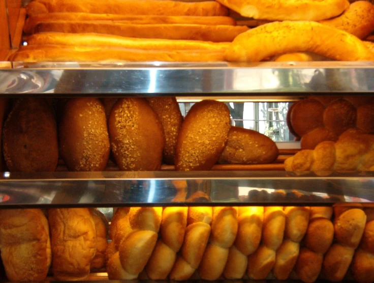 this bakery has so many donuts and rolls