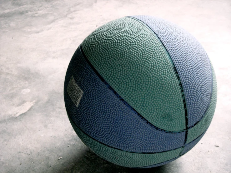 a ball on the ground next to the floor