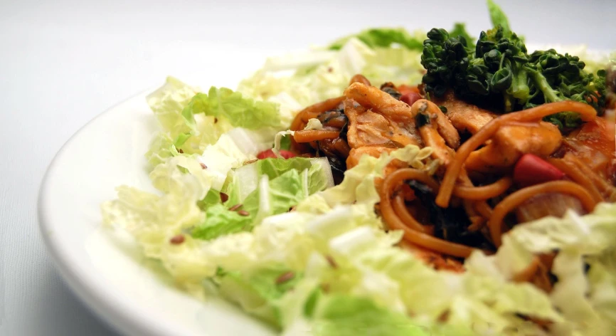 a close up of some food on a white plate