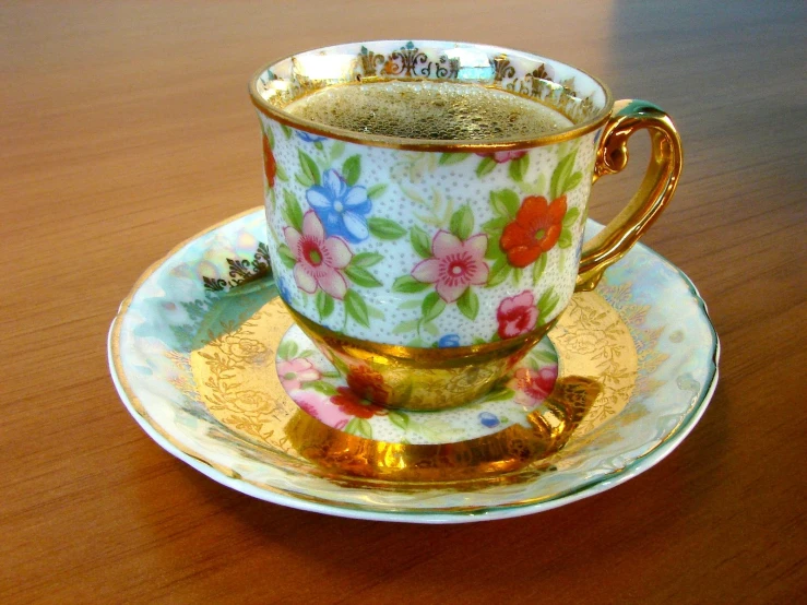 a coffee cup on a saucer and plate