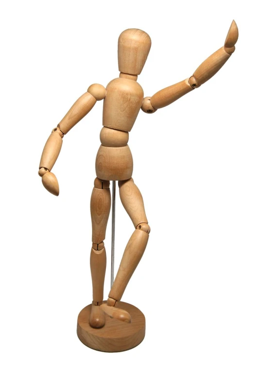 wooden statue holding a ball and standing on top of a stand