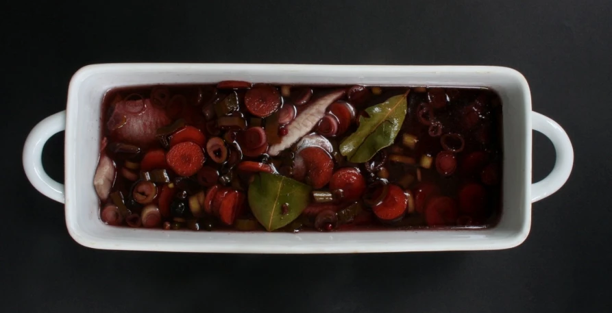  and sour vegetables are in the water in a bowl