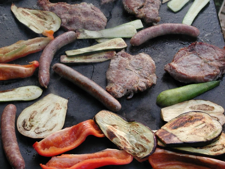 the ingredients for this beef and vegetable meal are neatly prepared