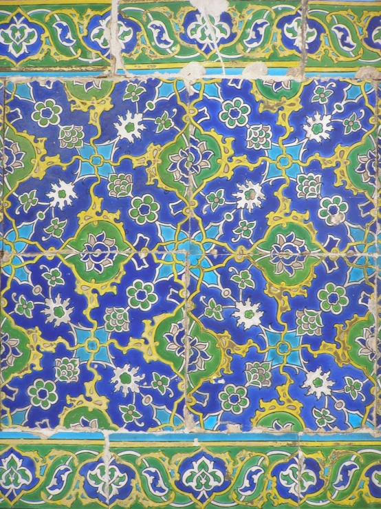 a blue and yellow mosaic design on a white background