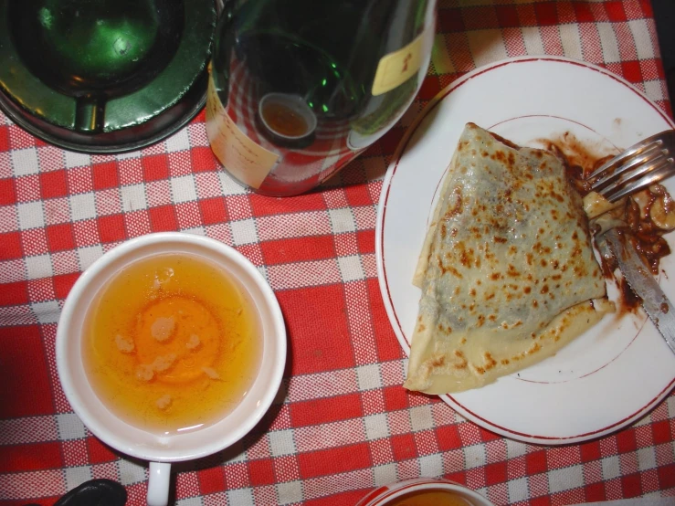 two dishes of food sitting on top of a table