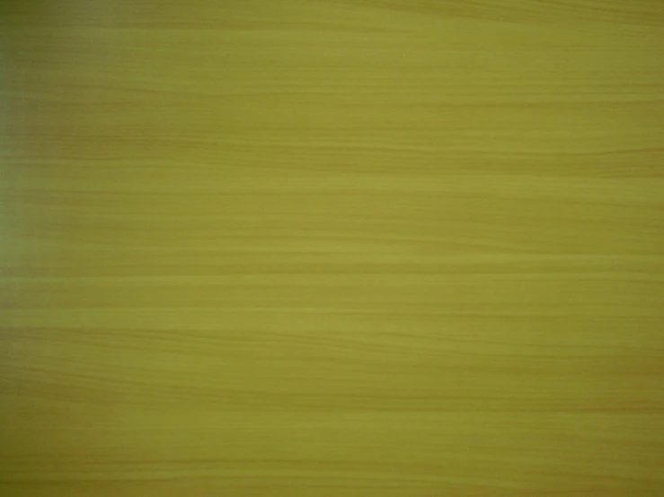 wood background showing different tones of yellow