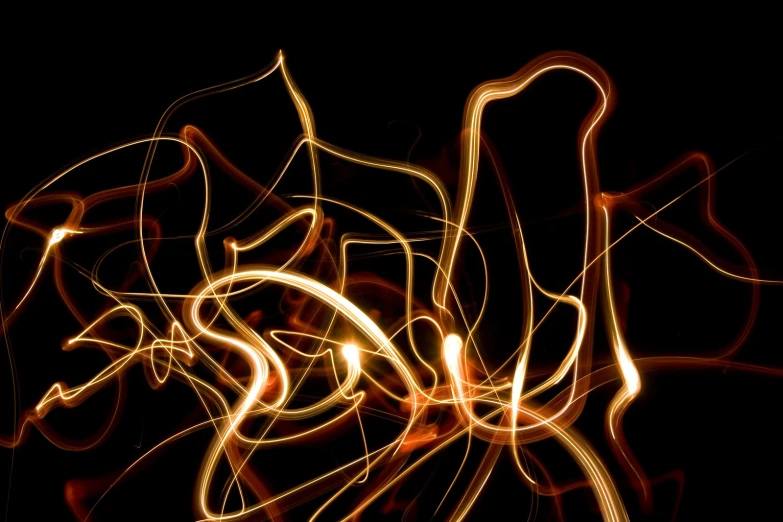 an abstract image of a firework pattern in gold