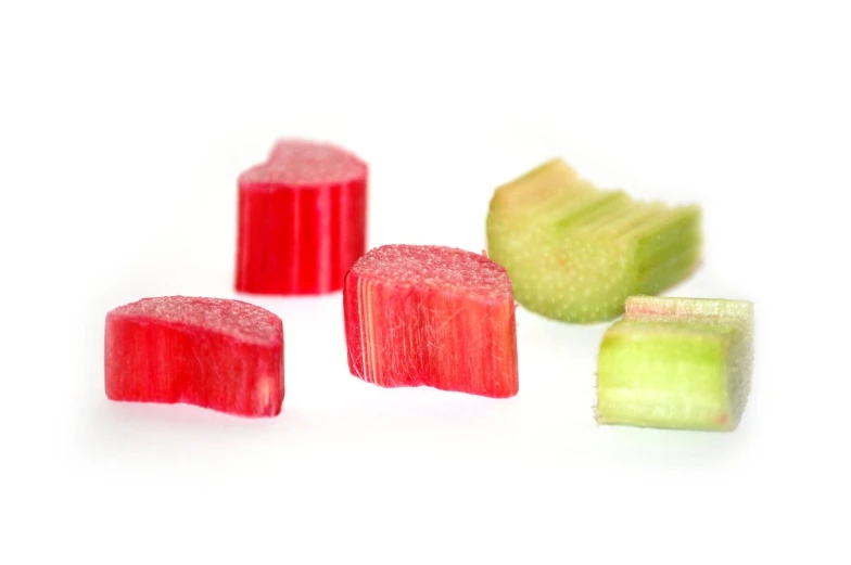 a close up of several colored fruit candy