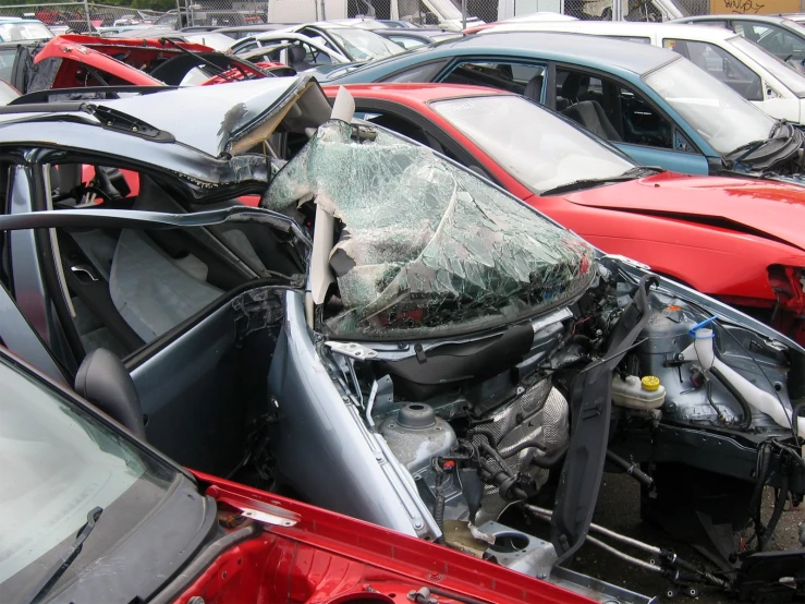 a couple of cars that have been smashed down