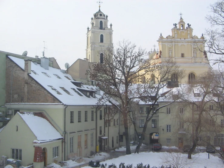 old buildings with spires and a clock tower