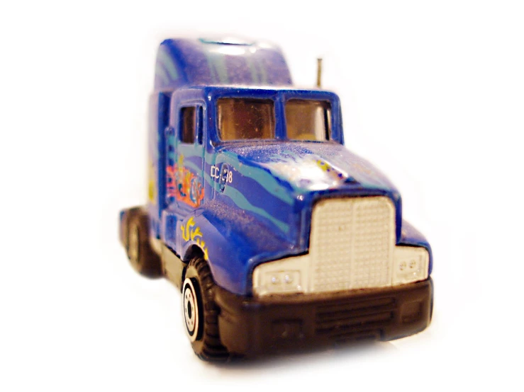 a toy truck that has been put on a table