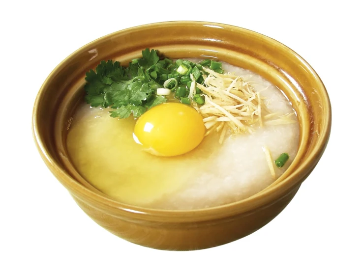 the bowl of food has egg on top of rice