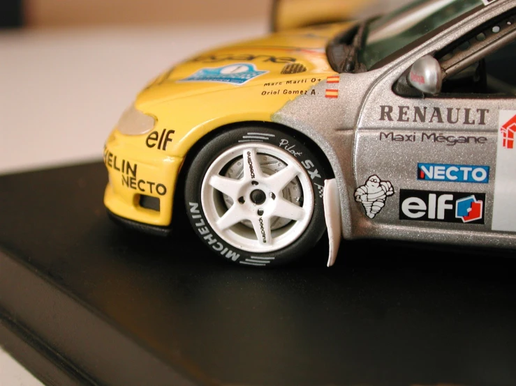 a toy model of a car with its wheels out