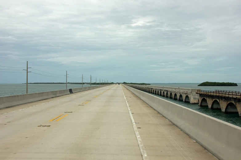 an overpass for a street near a body of water