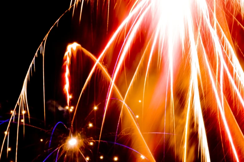 colorful fireworks are seen in the sky at night