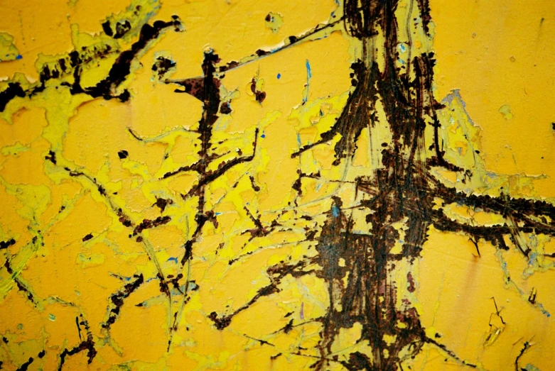 a yellow, orange and black abstract paint
