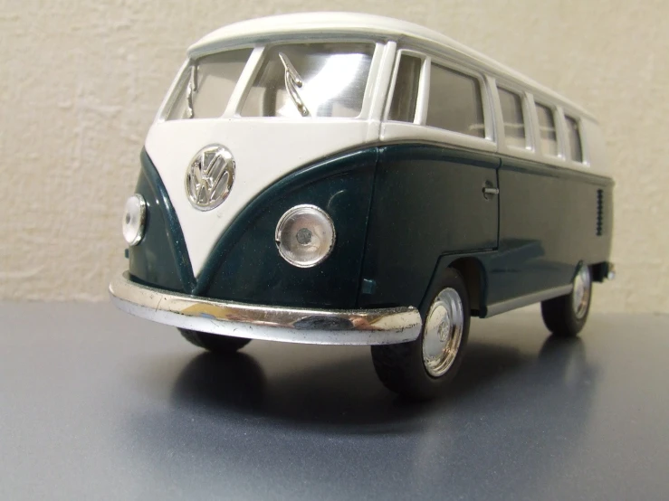 an old school bus model with the hood up