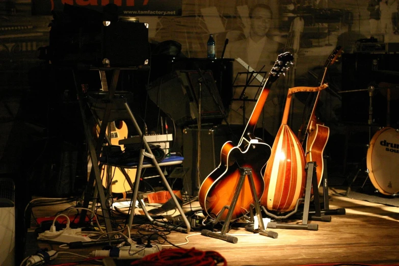 musical instruments stand in the middle of a room