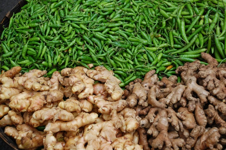 an assortment of ginger, green beans and other vegetables