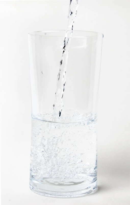 the water is boiling in a glass with ice