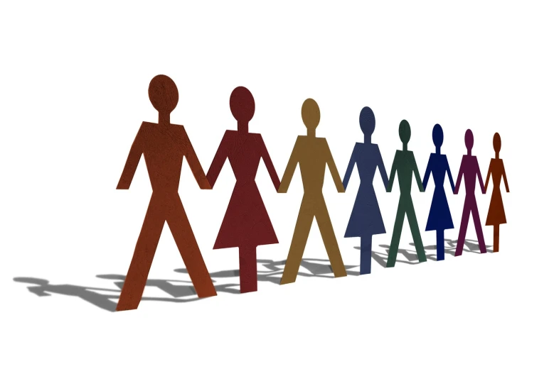 four different colored figures holding hands