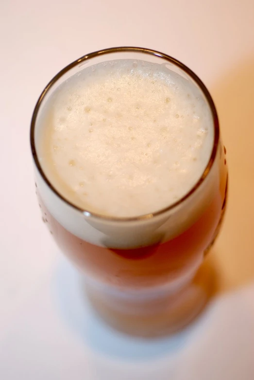 a close - up po of an extremely pale colored beer