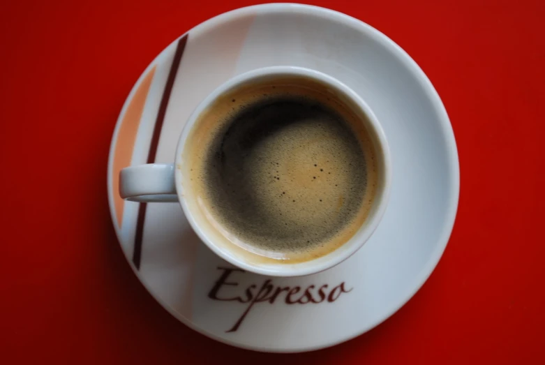 espresso latte cup with a handle with the word espress written