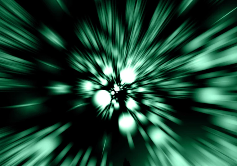 a green and white swirl pattern on a dark background